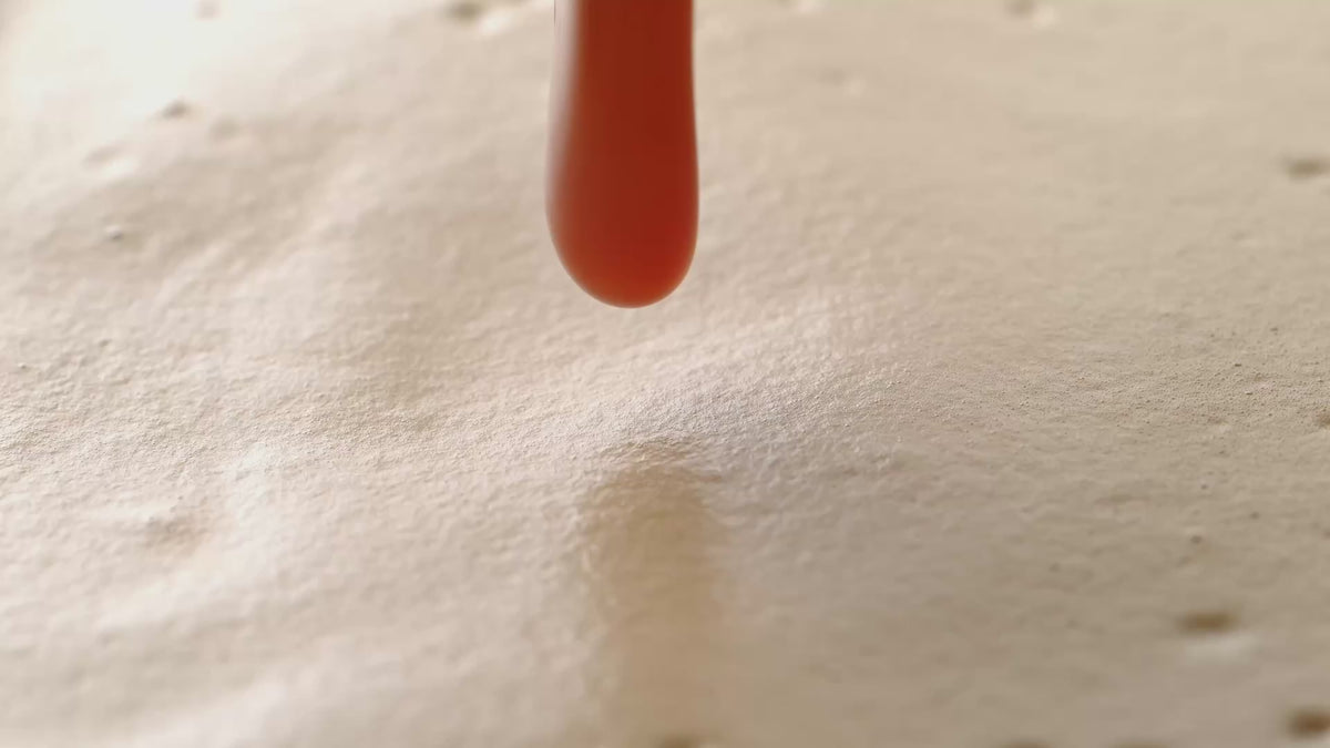 caramel drizzled into coffee and milk