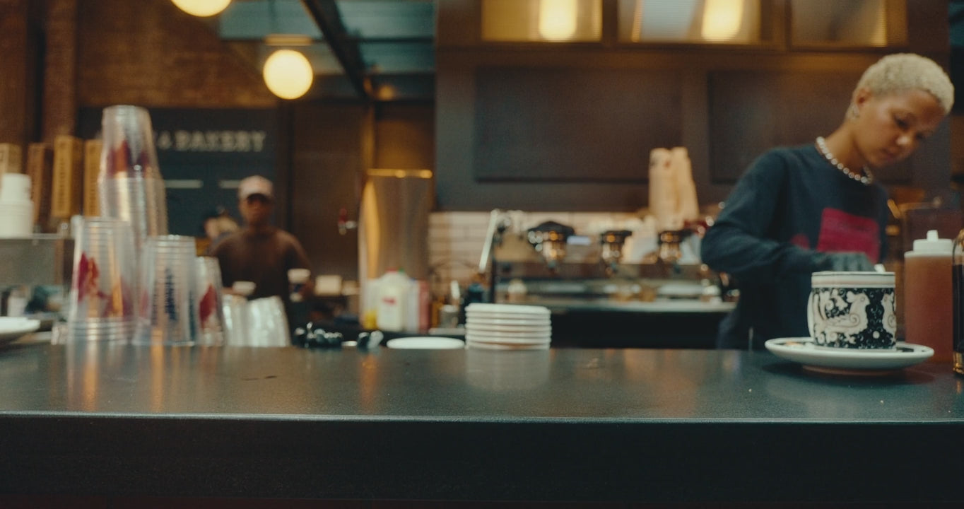 baristas working behind the bar at our cafe