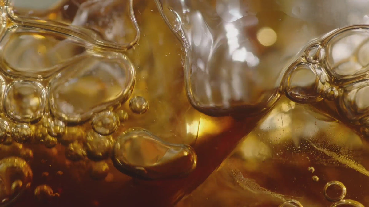 cold brew swirling in a glass